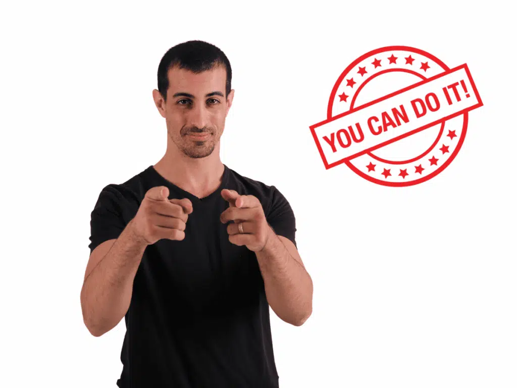 A man in a black shirt points forward with a confident expression, alongside the text "YOU CAN DO IT!" in red with stars.