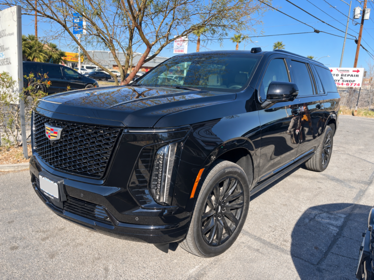 Black Cadillac Escalade photographed outside Universal Motorcars