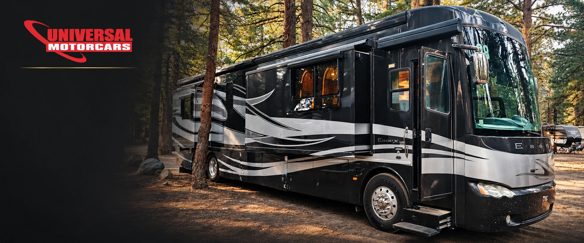 Black and silver Essex motorhome with Universal Motorcars branding and a dark fade