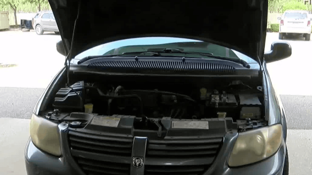 Open-hood vehicle pictured in News 3’s summer car-care report