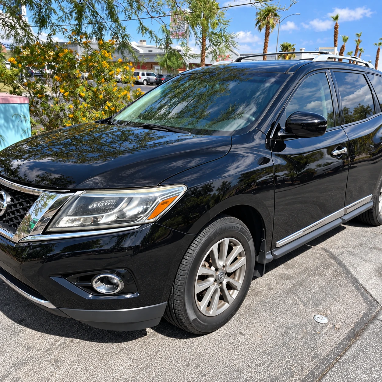 Black Nissan Pathfinder front bumper and fender.