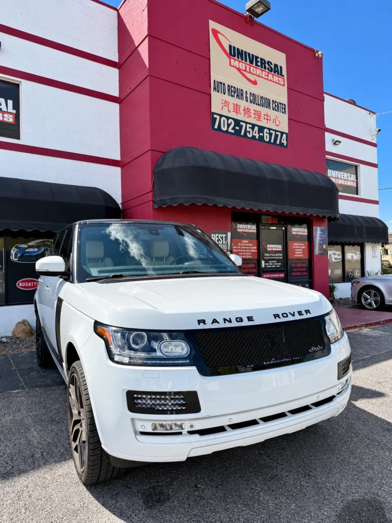 Front three-quarter view of a white Range Rover at Universal Motorcars.