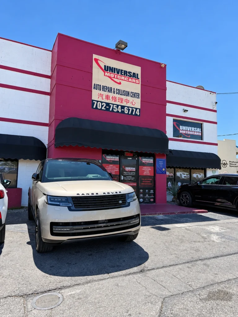 Front view of a silver Range Rover outside Universal Motorcars.