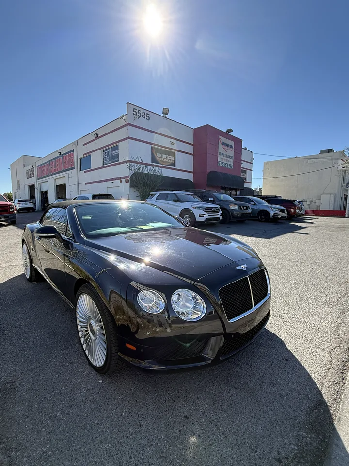 Black Bentley Continental GT outside Universal Motorcars