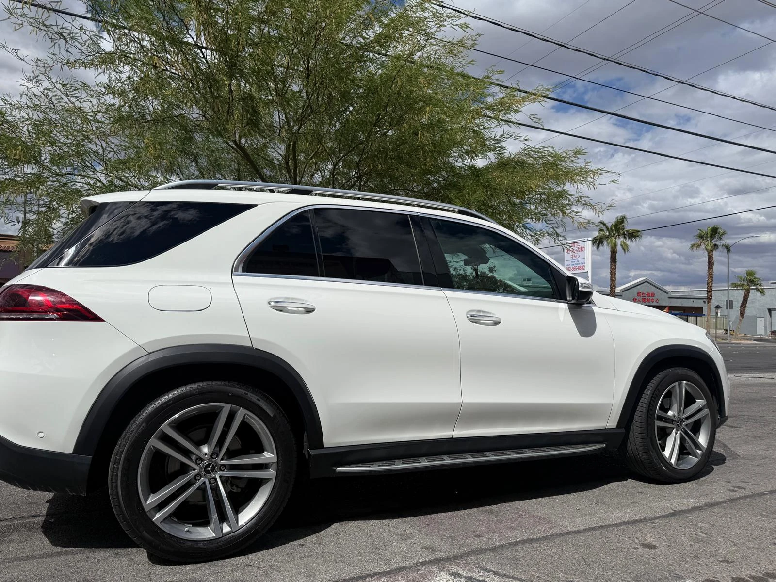 Completed Mercedes-Benz SUV passenger-side doors, trim, and exterior finish