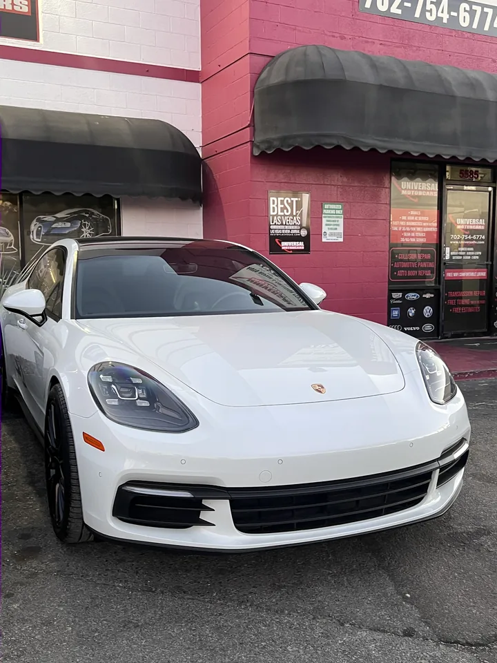 White Porsche Panamera, front three-quarter view